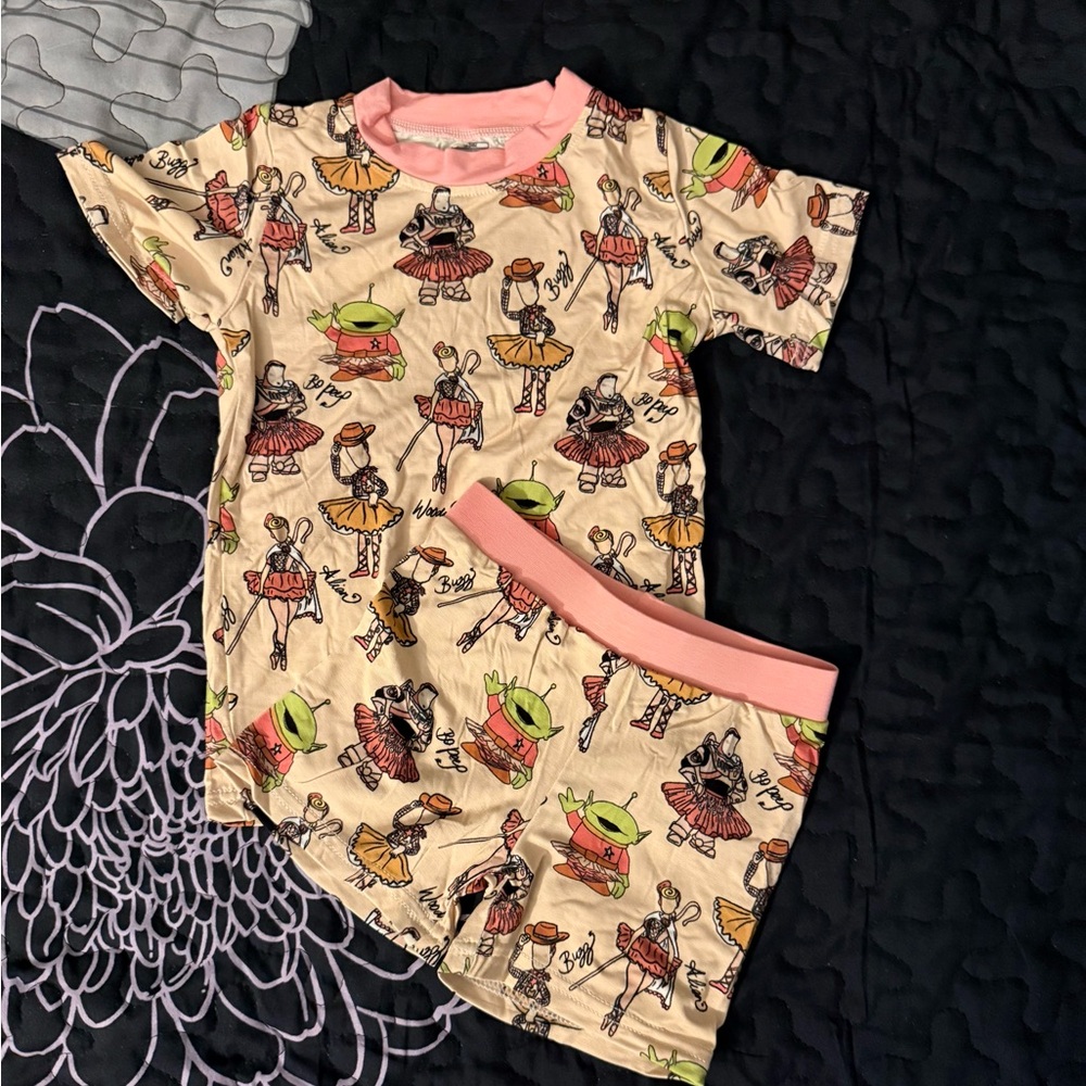 H&M Cream Pajama Set with Pink Trim and Multicolor Character Print